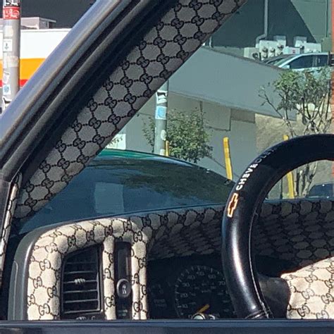 car with gucci interior|gucci decor temporary.